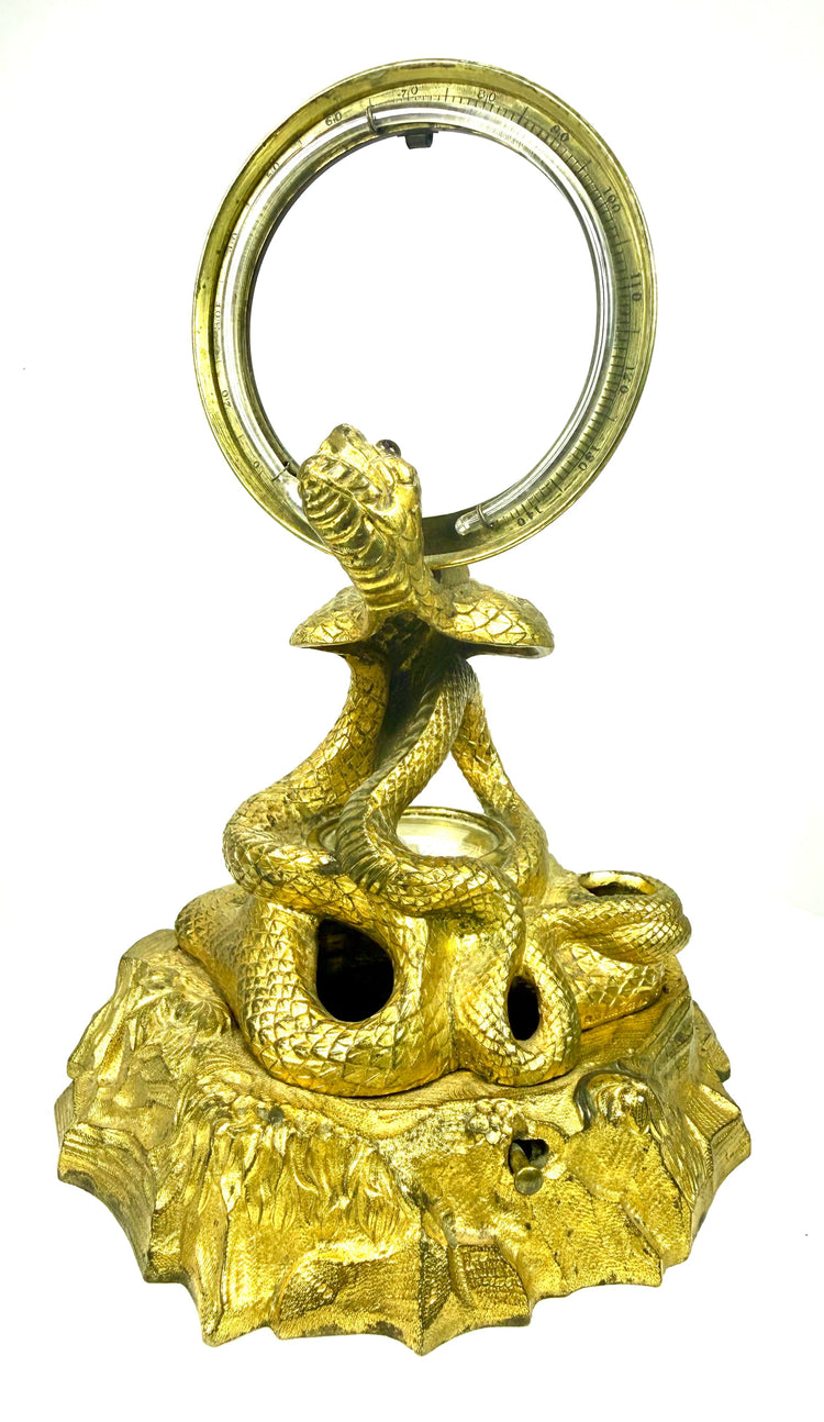 Victorian cobra desk accessory with a hinged upper section revealing the interior compartment originally intended for ink.