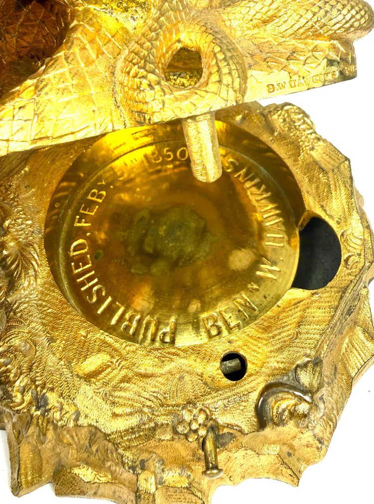 Victorian gilt bronze cobra sculpture with intricately modelled serpent coils, ribbed underside, and naturalistic detailing.