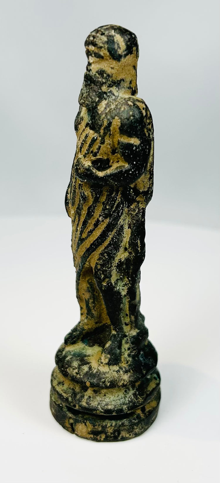 Antique miniature bronze figure with philosopher-like expression and drapery