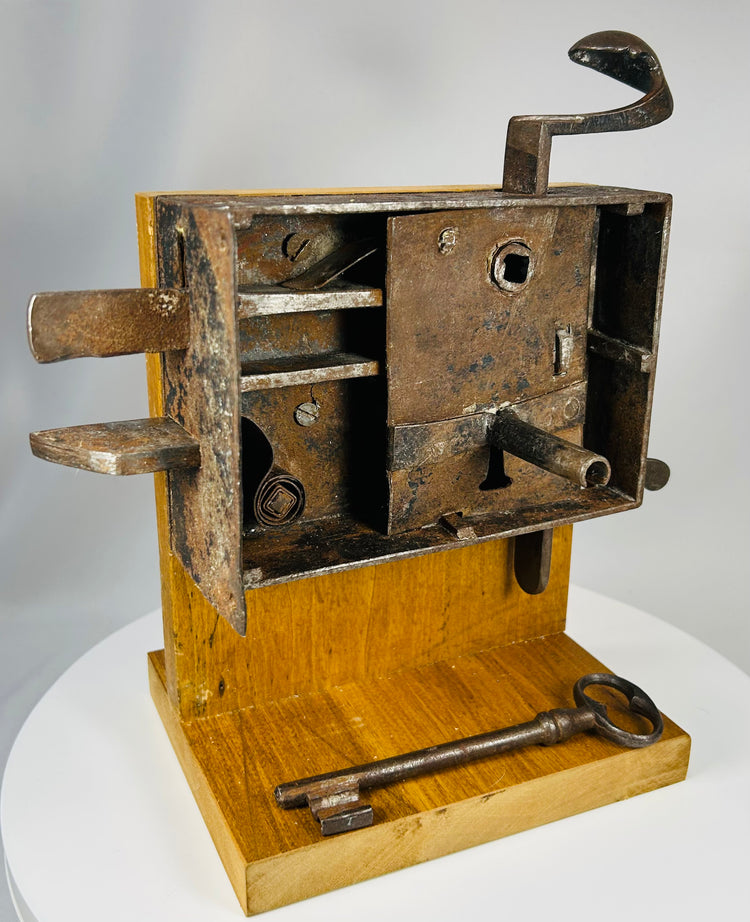 Antique iron lock with sliding bolts and large skeleton key included