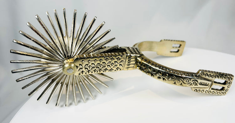 Nickel silver Chilean spurs with intricate patterns and original fitted case