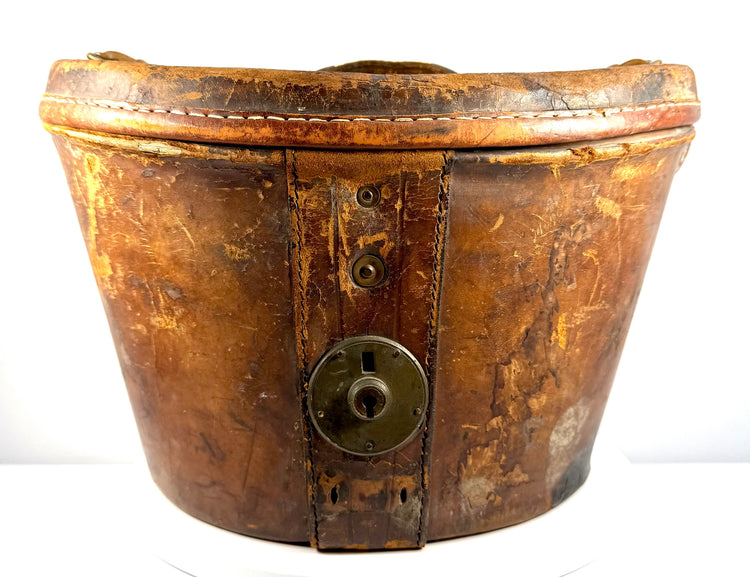 Early 20th-century Scott & Co. gentleman's silk top hat featuring a tall structured crown and elegant black finish.
