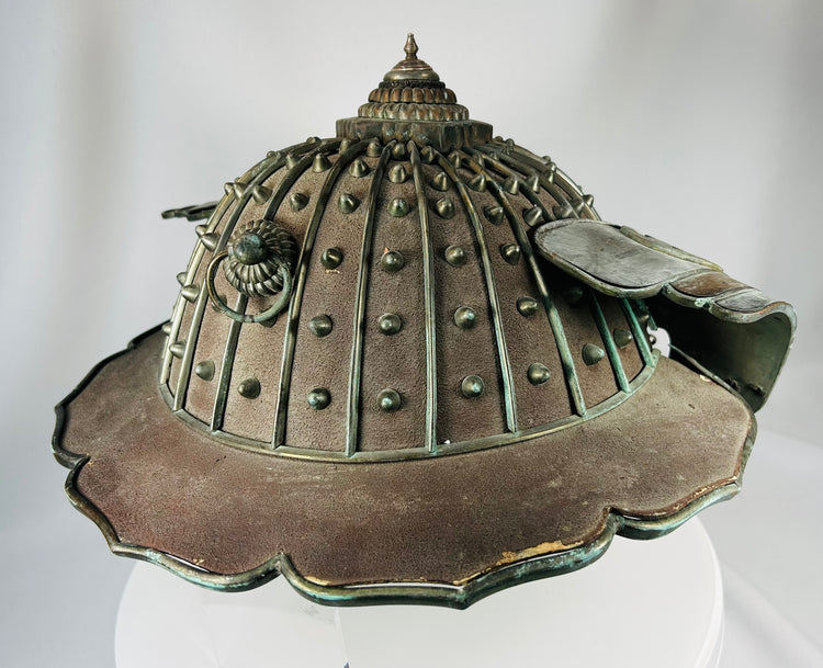 19th century Japanese firefighter helmet with scalloped brim and metal detailing