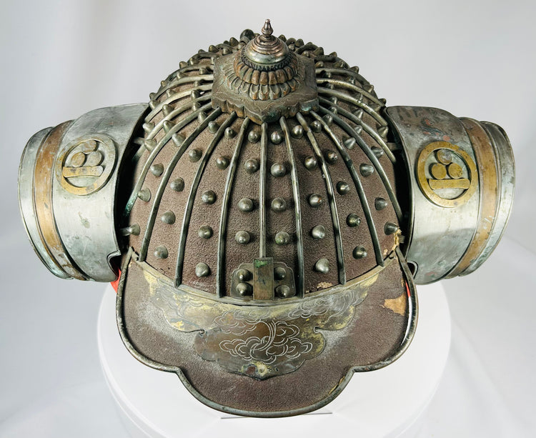Kaji Kabuto helmet with decorative mon crests and engraved front plate