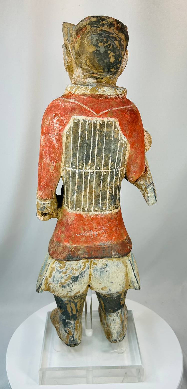 Chinese Han Dynasty soldier statue with red tunic and lamellar armor detail