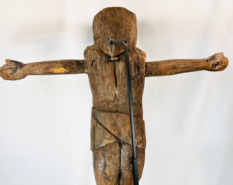 Colonial era devotional corpus figure with rustic carved details and patina