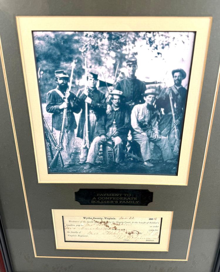 Reddish-brown wooden frame containing an original 1864 Virginia Confederate relief voucher, historical photograph, and protective glass.