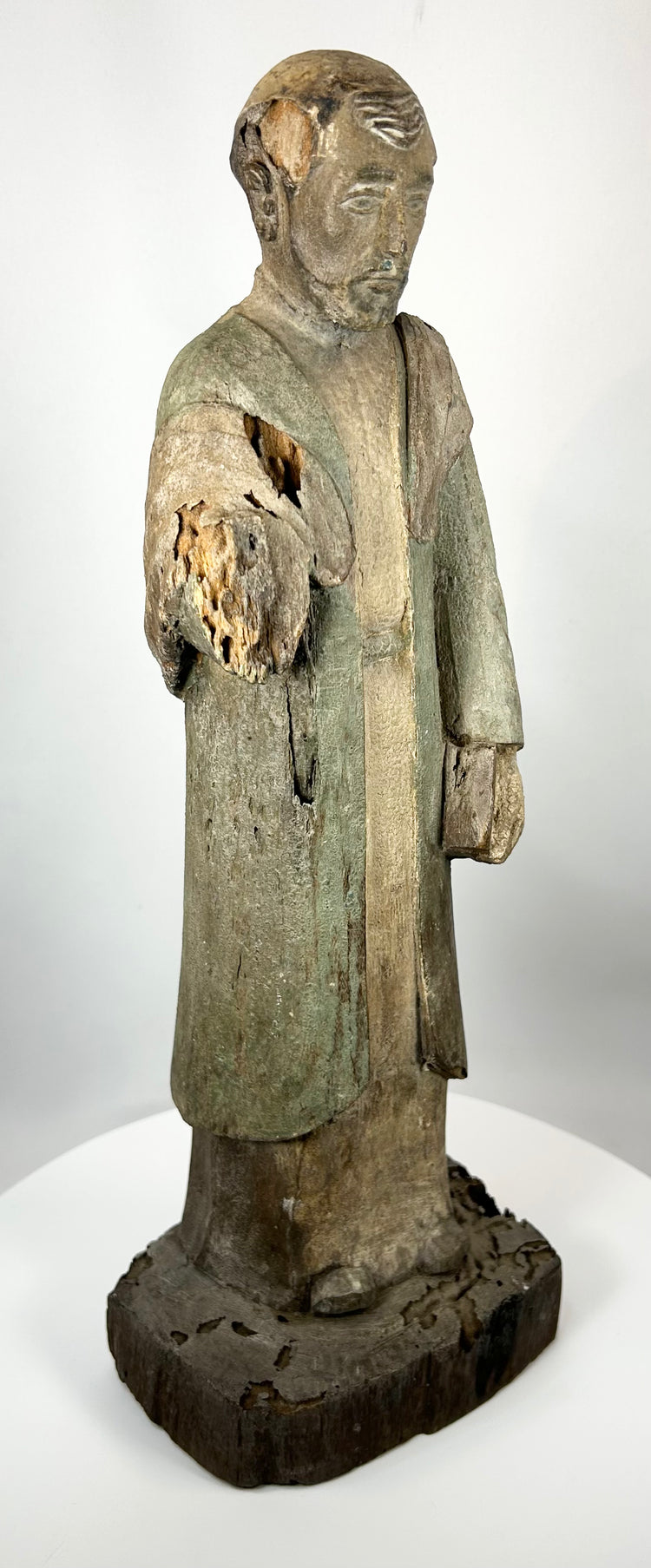 Spanish Colonial folk art religious sculpture with aged cracking and wear
