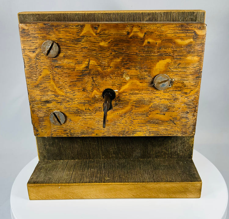 Vintage door lock with skeleton key showing early warded locking system