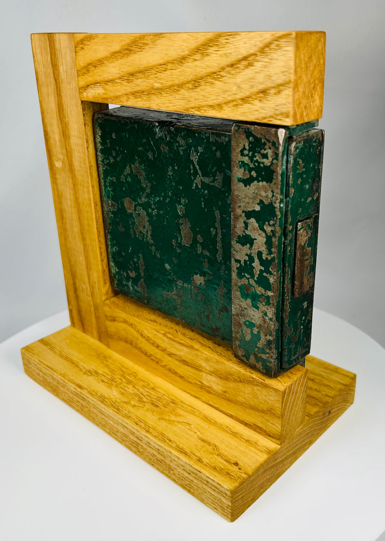 Antique iron rim lock hardware showing age wear and craftsmanship detail