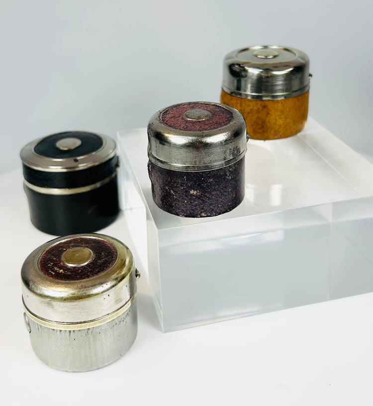 19th century travel inkwells with hinged lids and nickel-plated finish