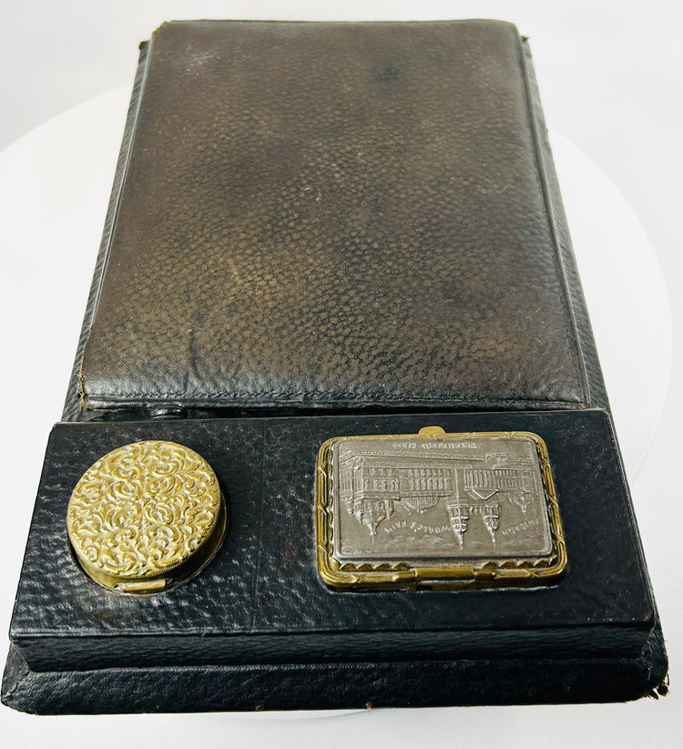 Late 19th century writing slope with aged leather and historic plaque detail