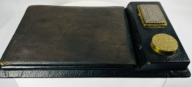 Victorian era portable desk with circular inkwell container and compartments