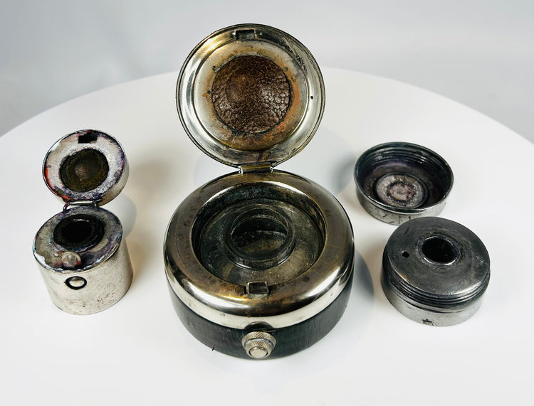 Portable inkwell set with hinged lids and cylindrical metal containers