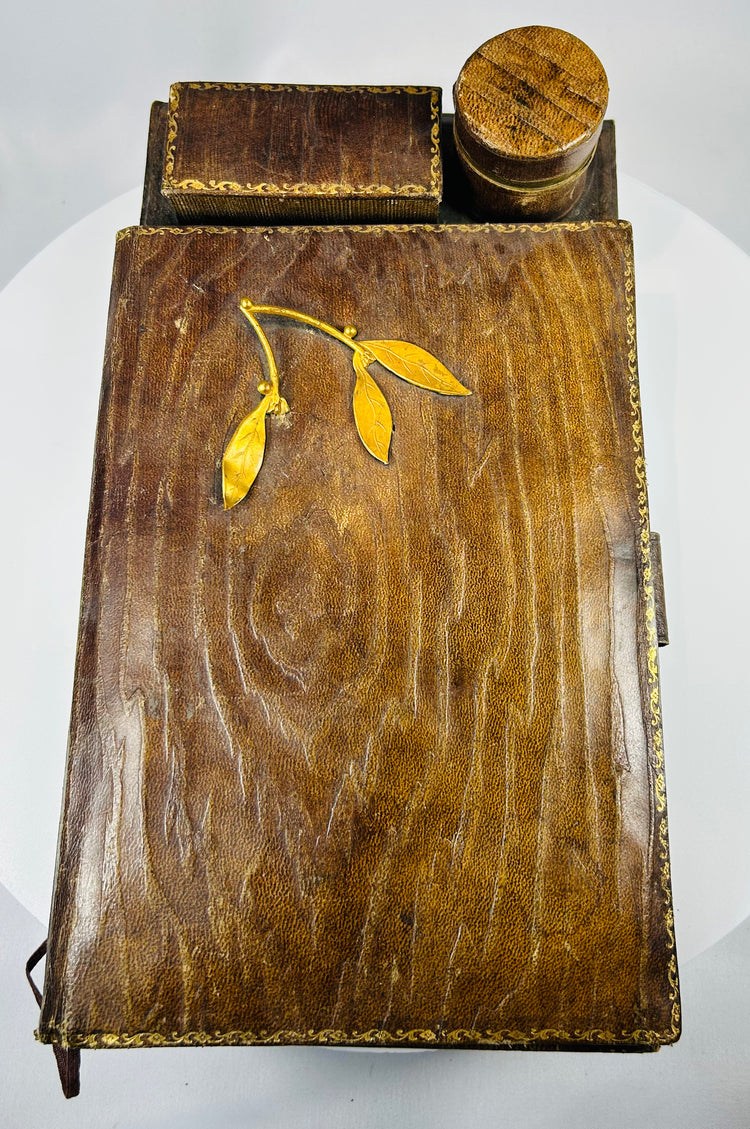 Portable writing slope with gilt border tooling and metal leaf decoration