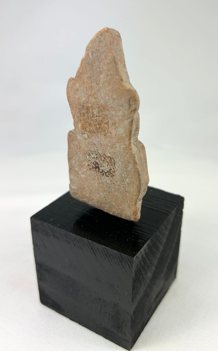 Hand-molded terracotta figure from Northern India, 3rd–6th century CE, traces of pigment, mounted artifact