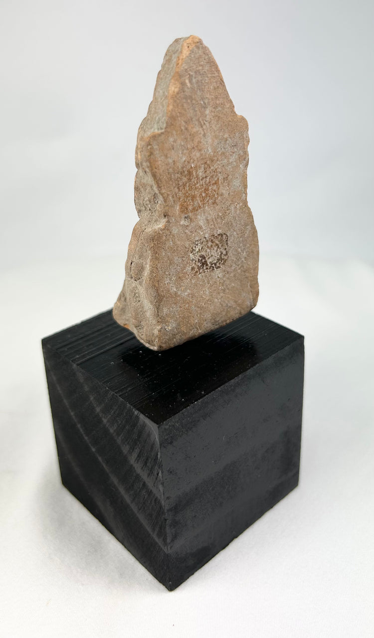 Northern Indian terracotta votive figure, early centuries CE, hand-molded anthropomorphic form, display-mounted