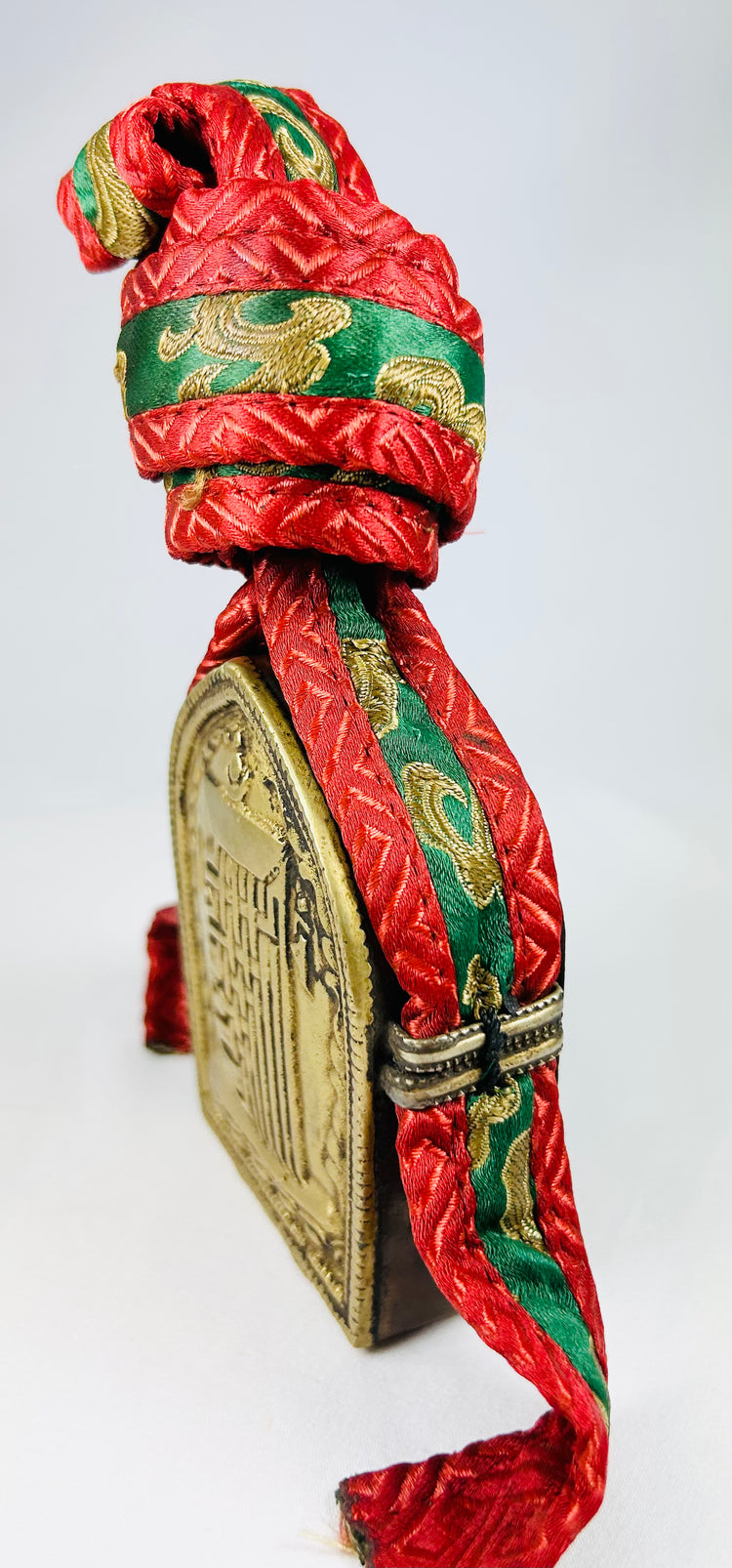 Antique Buddhist gau shrine box from Tibet with repoussé script and intact embroidered pouch
