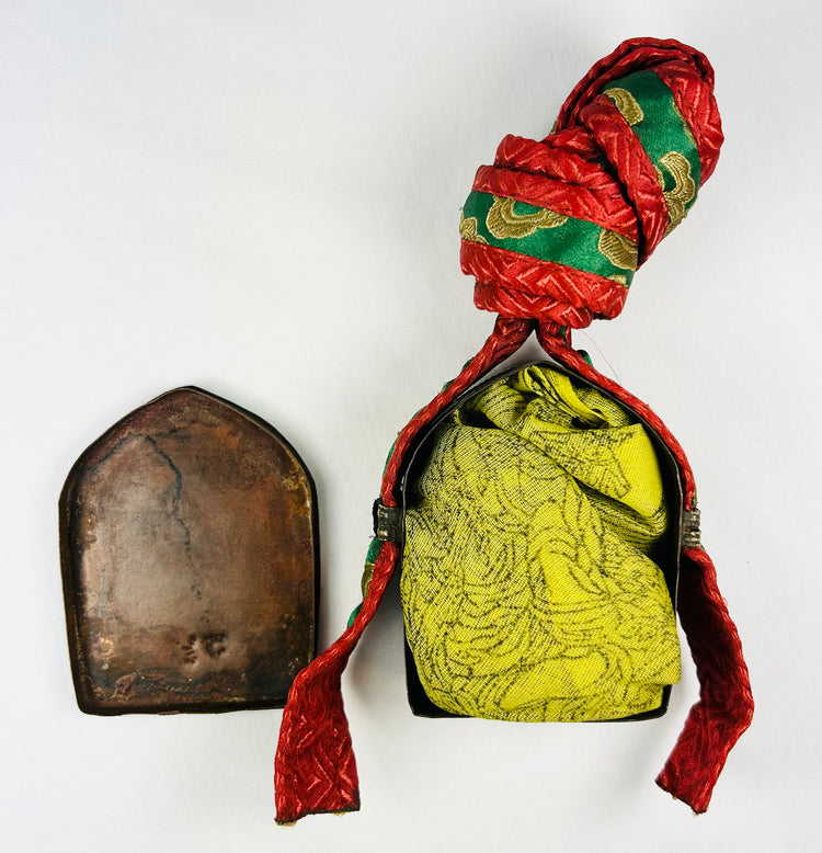 Antique Tibetan gau amulet box with brass repoussé Buddhist script and embroidered carrying pouch