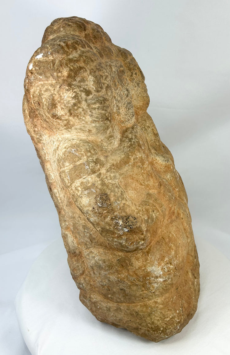 Rear view of Majapahit three-faced Brahma stone sculpture, 14th–15th century Java, Indonesia, carved from volcanic andesite with natural patina and temple wear.