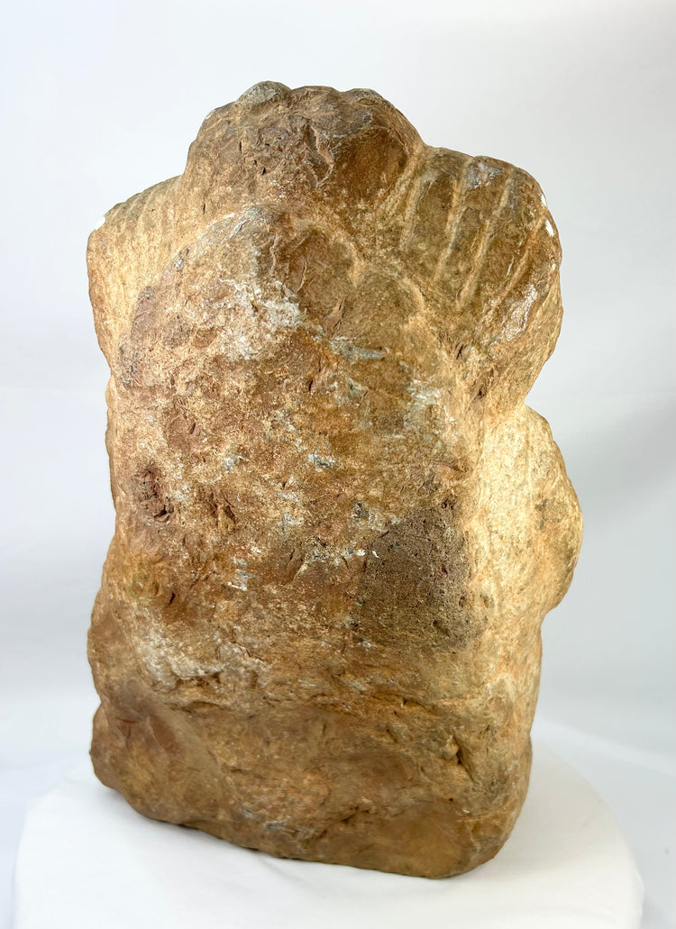 Back view of Majapahit three-faced Brahma stone sculpture, 14th–15th century Java, Indonesia, carved from volcanic andesite with weathered surface and natural patina.