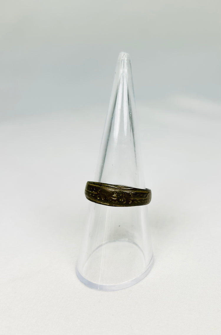 Ancient Roman ring worn as symbol of status or identity with decorative engraving