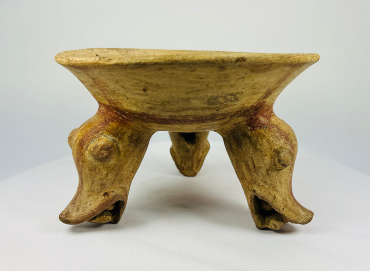 Ancient ceramic bowl with three animal-form legs and red-brown slip, Costa Rica, 800–1200 AD