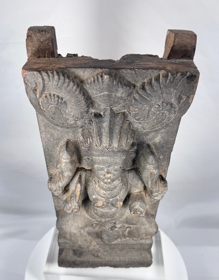 Carved wooden Gajalakshmi figure symbolizing prosperity and abundance