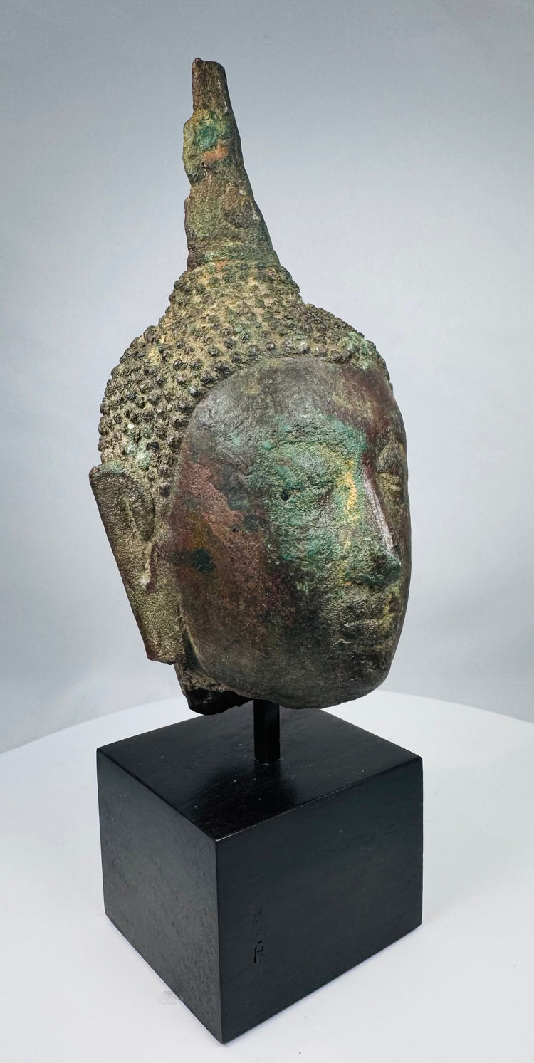 Medieval Thai bronze Buddha sculpture mounted on a custom display stand