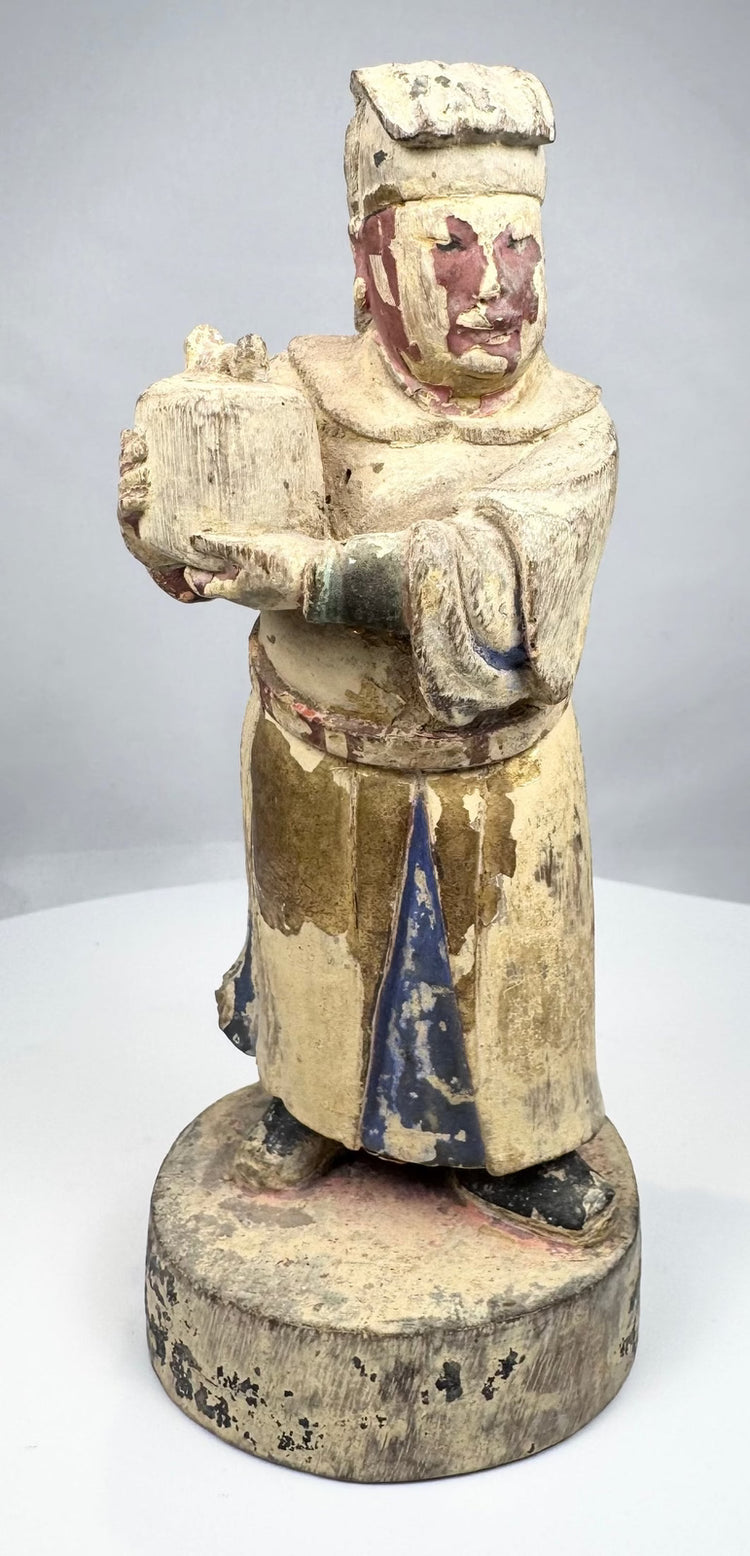 Late Qing Dynasty carved wood official with surviving pigment