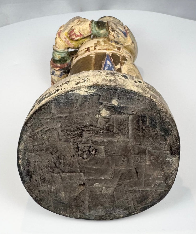 Reverse of an antique Chinese polychrome wooden sculpture