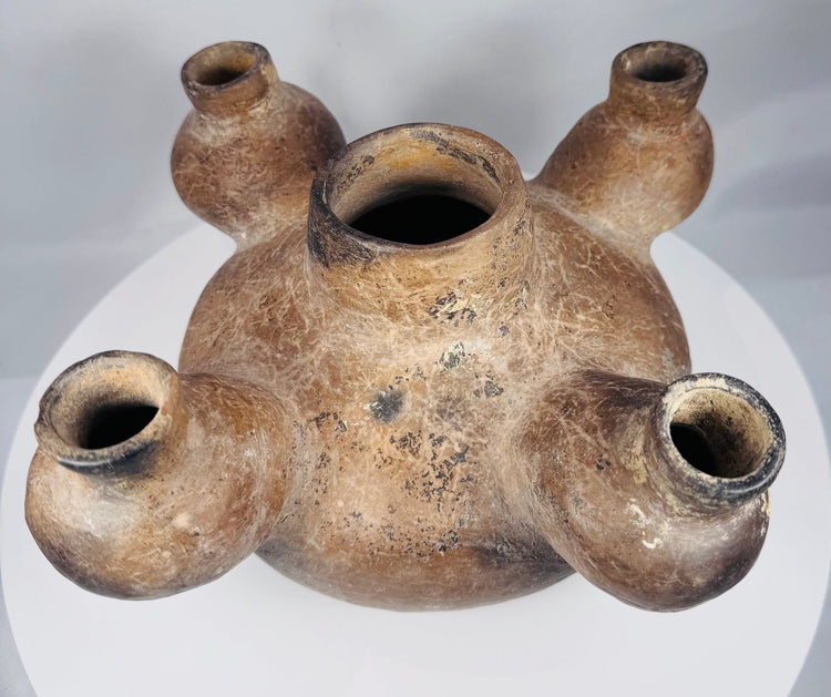 Profile of an ancient Colima ceramic vessel with globular chambers