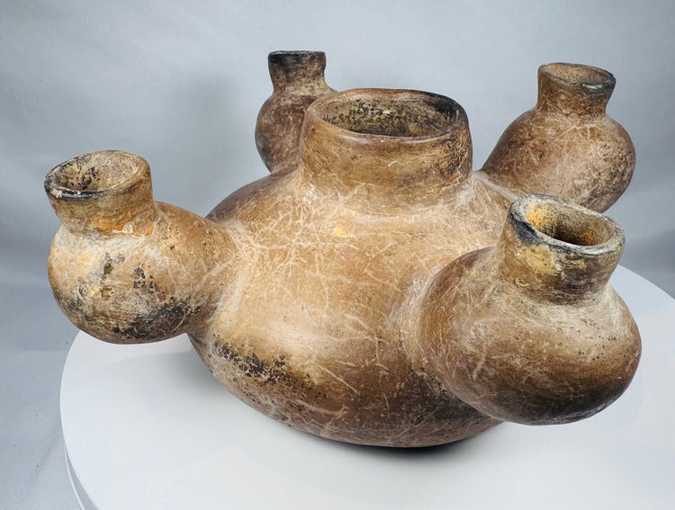 Pre-Columbian ceramic vessel with buff, brown, and black coloration