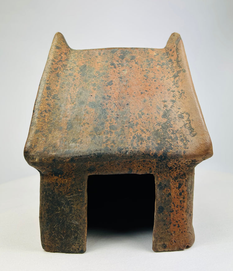 Late Formative period ceramic house model showing doorway and roof detail.