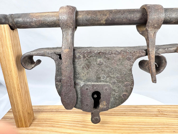 European wrought-iron sliding hasp lock with multiple forged loops and retainers
