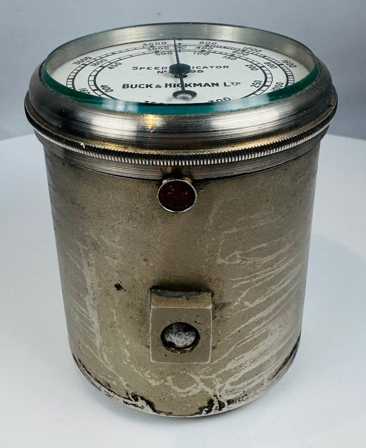 Vintage British speed indicator displayed inside its original carrying case