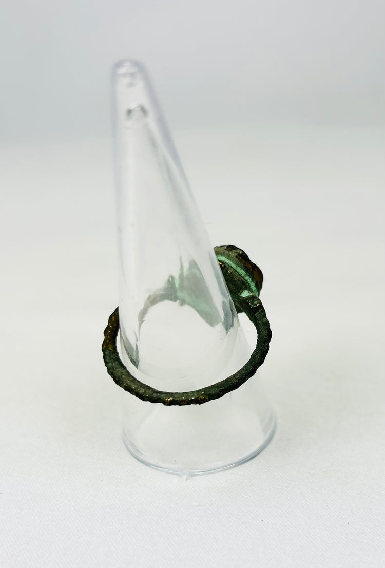 Ancient wearable bronze ring showing oxidation and timeworn features