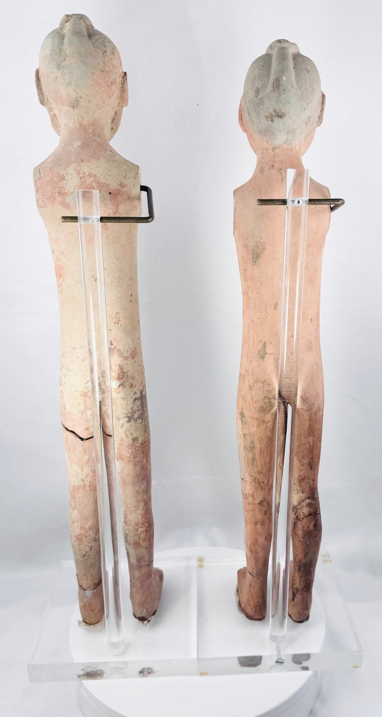 Shoulder apertures once fitted with wooden arms on a Han terracotta attendant