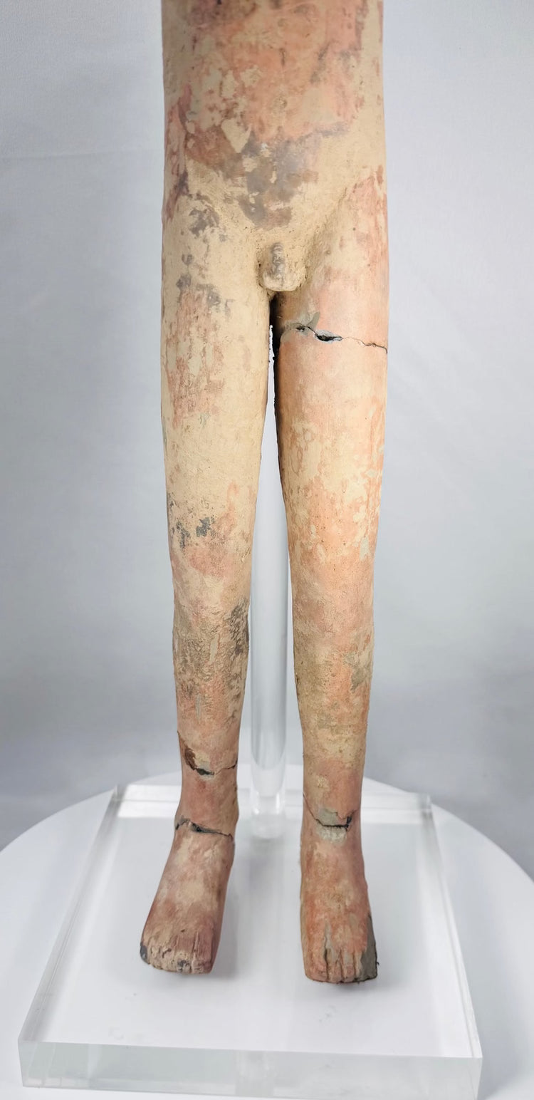 Ancient Han funerary figure with weathered cream surface and mineral encrustation