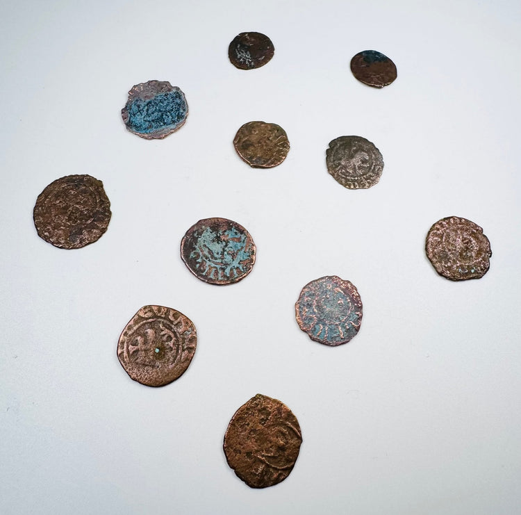 Assorted Crusader coinage with irregular flans, worn legends, and religious symbols