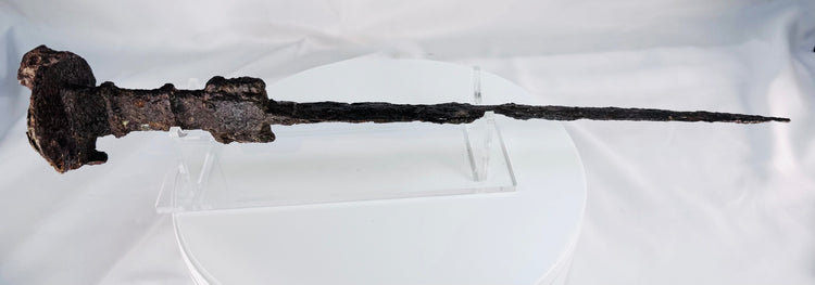 Ancient Luristan iron short sword from Western Iran dating to circa 750–650 BCE, shown in full with its straight blade and lion-head disc pommel.