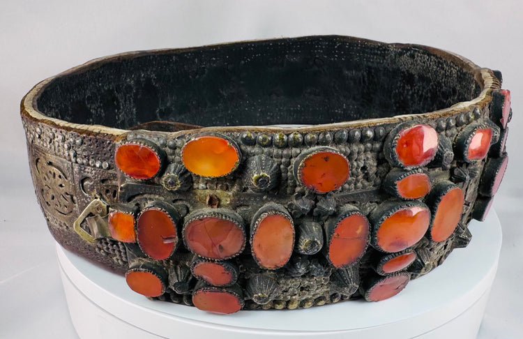 Antique Southern Russian bridal belt with hand-fitted Cornelian stones, riveted brass construction, and aged ceremonial patina.