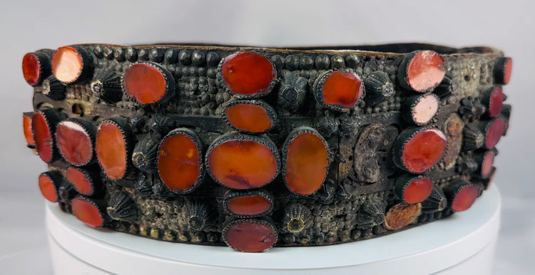 Rare Jewish ceremonial wedding belt from Southern Russia with pierced brass decoration, riveted fittings, and preserved Cornelian gemstones.