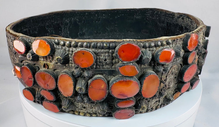 17th–18th century Jewish bridal belt from Southern Russia featuring pierced brass plates and rows of orange Cornelian gemstones.