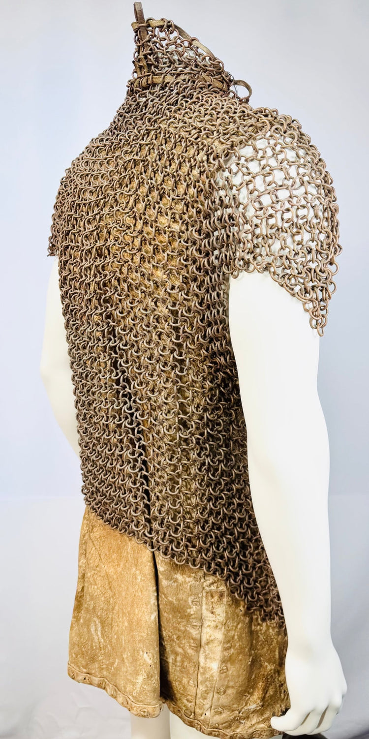 Detail of worn leather fastenings on historic Philippine Moro armour