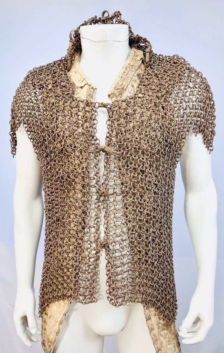Maranao-style body armour with dense copper-alloy mail and peaked shoulders