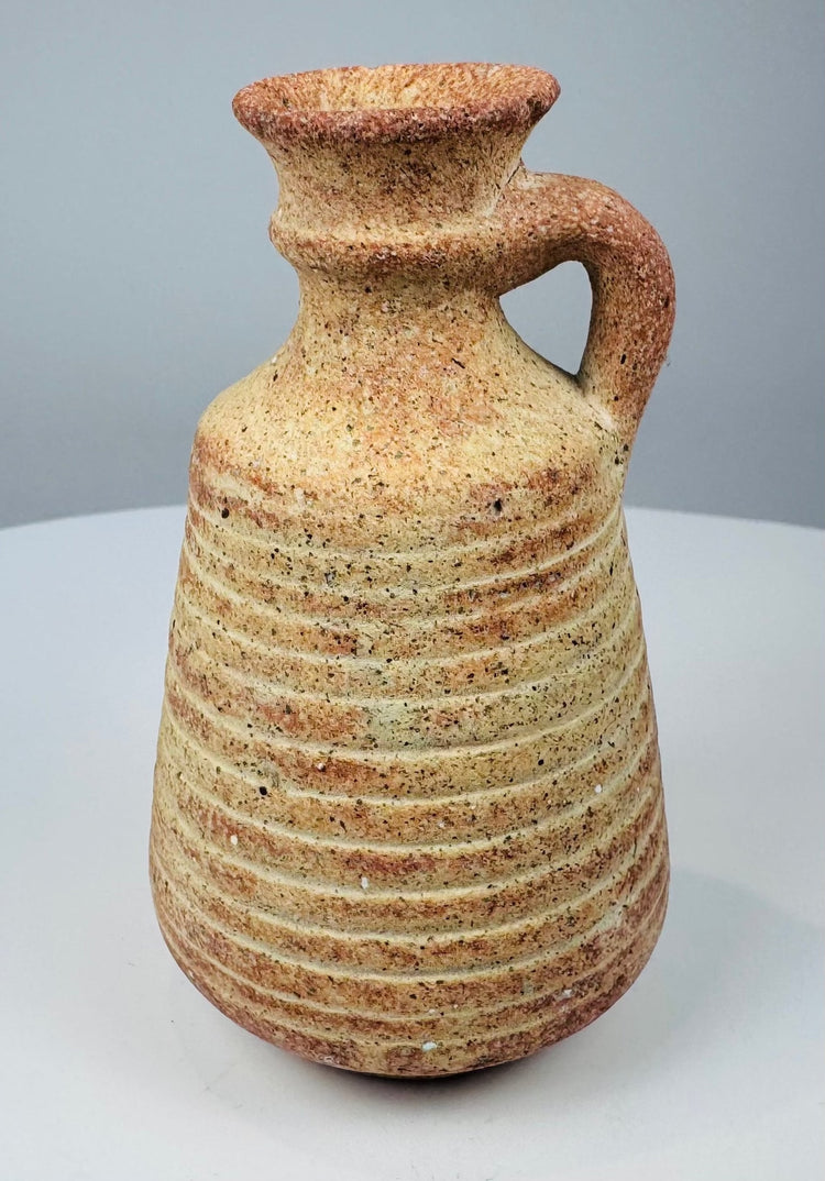Roman–Late Antique terracotta vessel with narrow neck and outward-flaring mouth
