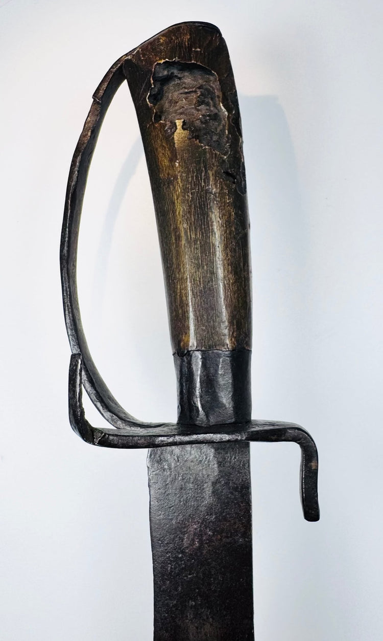 Early Colonial sidearm with a wrought-iron hilt, D-shaped knuckle bow and wooden handle
