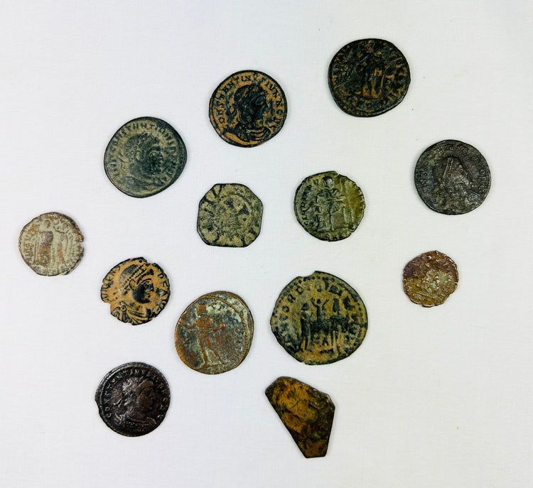 Ancient Roman coin reverse displaying deity and symbolic imagery