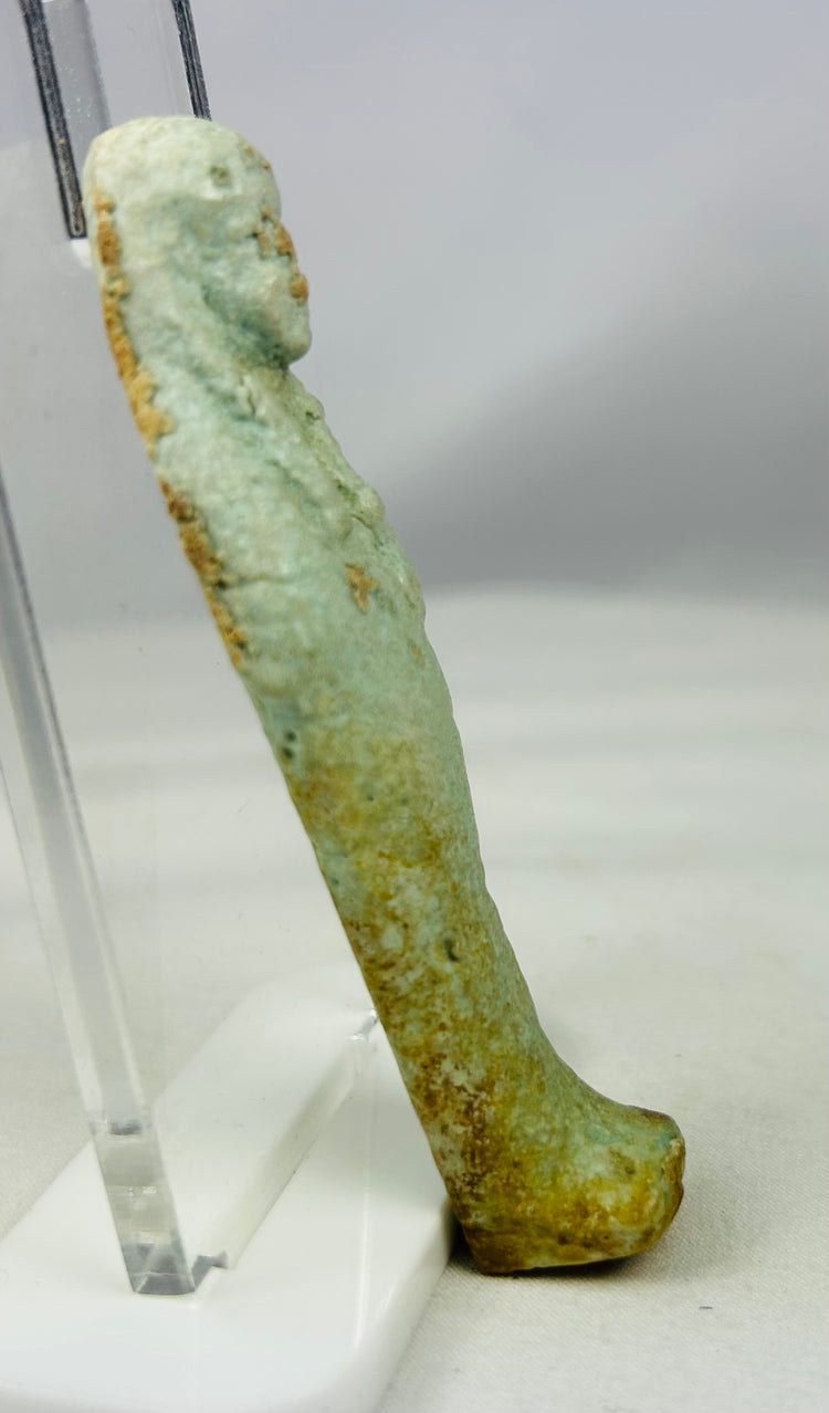 Blue-green faience Ushabti statue showing traditional mummy-form posture